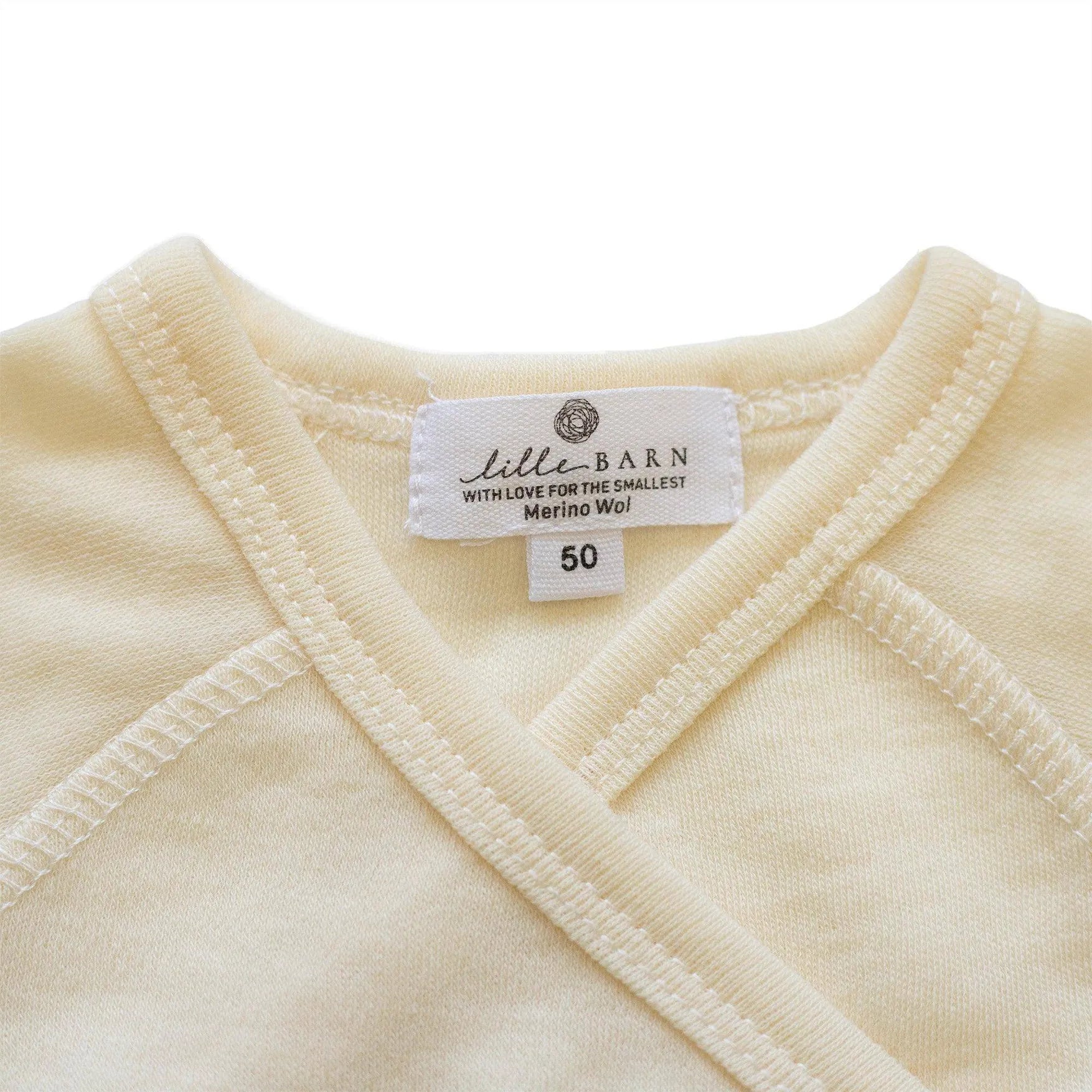 Tutina Neonato con Piedini in Lana Merino – Chiusura a Portafoglio