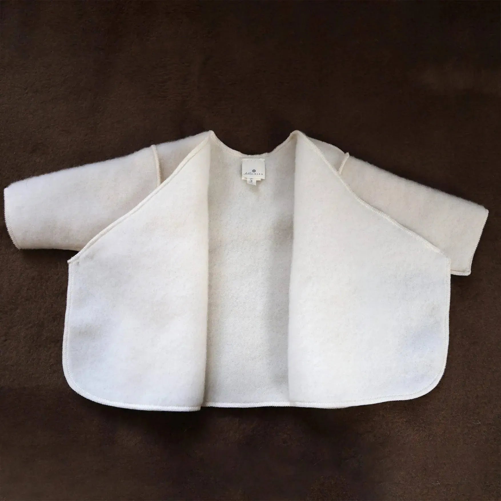 Cardigan Neonato in Pura Lana Merino – Morbida e Calda